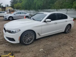 2018 BMW 5 Series 530i z VIN WBAJA5C55JWA36934, wystawiony jako Copart lot #56517475 z przebiegiem 165 412 mil mil oraz Tytuł czysty. Historia ofert i sprzedaży dostępna na DreamBid. Obrazek 1.