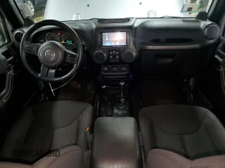 2014 Jeep Wrangler Unlimited Sport with VIN 1C4BJWDG9EL140263, listed as a Copart auction lot 47652785 with 39,493 mi miles and Salvage Title. Bid and sale history available at DreamBid. Image 8.