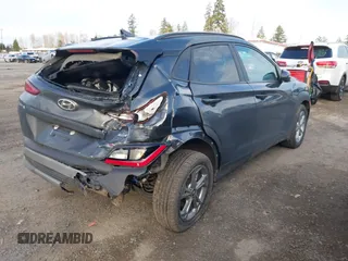 2023 Hyundai Kona SEL with VIN KM8K6CAB5PU935683, listed as a IAAI auction lot 41680852 with 59,057 mi miles and . Bid and sale history available at DreamBid. Image 4.