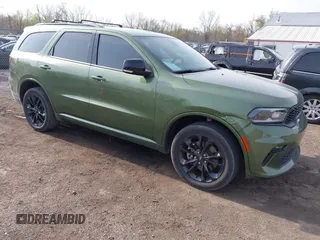 2021 Dodge Durango GT Plus with VIN 1C4RDJDGXMC663928, listed as a IAAI auction lot 42070119 with 77,110 mi miles and . Bid and sale history available at DreamBid. Image 1.