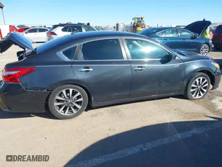2017 Nissan Altima 2.5 SV with VIN 1N4AL3AP0HC277398, listed as a IAAI auction lot 40918944 with 214,412 mi miles. Bid and sale history available at carsss.com. Image 14.
