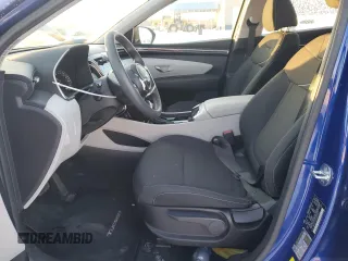 2022 Hyundai Tucson SE with VIN 5NMJA3AE6NH007667, listed as a Copart auction lot 87687995 with 27,658 mi miles and Salvage Title. Bid and sale history available at DreamBid. Image 7.
