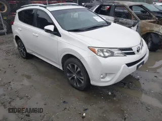 2015 Toyota RAV4 Limited z VIN JTMYFREV9FJ051087, wystawiony jako IAAI lot #41579035 z przebiegiem 173 683 mil mil oraz . Historia ofert i sprzedaży dostępna na DreamBid. Obrazek 1.