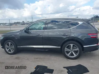2024 Genesis GV80 with VIN KMUHCESC7RU155291, listed as a IAAI auction lot 41544670 with 10,899 mi miles and . Bid and sale history available at DreamBid. Image 13.