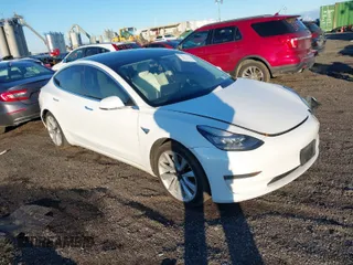 2020 Tesla Model 3 Long Range with VIN 5YJ3E1EB1LF796083, listed as a IAAI auction lot 41223450 with 119,497 mi miles. Bid and sale history available at carsss.com. Image 1.