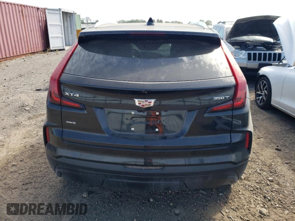 2024 Cadillac XT4 AWD Luxury with VIN 1GYFZBR4XRF199970, listed as a Copart auction lot 71496774 with 4,512 mi miles and Salvage Title. Bid and sale history available at carsss.com. Image 6.