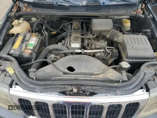 2003 Jeep Grand Cherokee Laredo z VIN 1J4GW48S53C568929, wystawiony jako Copart lot #57604245 z przebiegiem 216 103 mil mil oraz Czysty tytuł • Clean title. Historia ofert i sprzedaży dostępna na DreamBid. Obrazek 12.