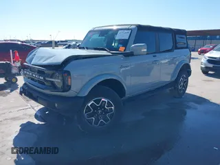 2021 Ford Bronco with VIN 1FMDE5BHXMLB06040, listed as a IAAI auction lot 41490539 with 57,915 mi miles. Bid and sale history available at carsss.com. Image 2.