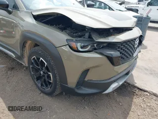 2023 Mazda CX-50 2.5 Turbo z VIN 7MMVABXY5PN131528, wystawiony jako IAAI lot #41968532 z przebiegiem 37 400 mil mil oraz . Historia ofert i sprzedaży dostępna na DreamBid. Obrazek 6.