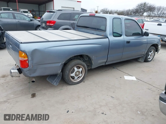 1997 Toyota Tacoma with VIN 4TAVL52N0VZ311543, listed as a IAAI auction lot 41644677 with 292,131 mi miles. Bid and sale history available at carsss.com. Image 4.