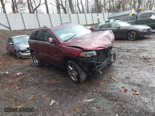 2018 Jeep Grand Cherokee Limited with VIN 1C4RJFBG9JC229424, listed as a IAAI auction lot 41208091 with 71,499 mi miles. Bid and sale history available at carsss.com. Image 1.