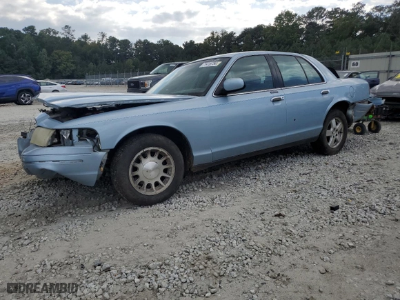 1999 Ford Crown Victoria LX with VIN 2FAFP74WXXX137154, listed as a Copart auction lot 71418784 with 97,589 mi miles and Salvage Title. Bid and sale history available at carsss.com. Image 1.