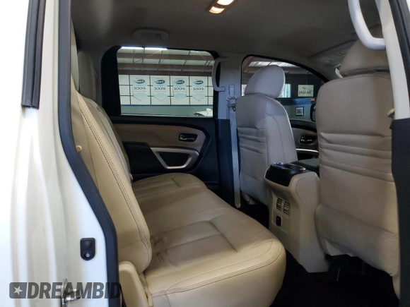 2017 Nissan Titan Pro-4X z VIN 1N6AA1E59HN504294, wystawiony jako Copart lot #65590525 z przebiegiem 160 695 mil mil oraz Czysty tytuł • Clean title. Historia ofert i sprzedaży dostępna na DreamBid. Obrazek 11.