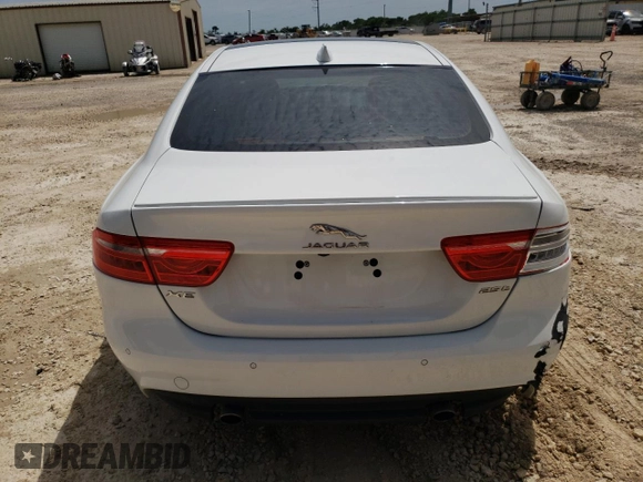 2018 Jaguar XE with VIN SAJAF4FX0JCP33858, listed as a Copart auction lot 54873844 with 46,402 mi miles and Salvage Title. Bid and sale history available at DreamBid. Image 6.