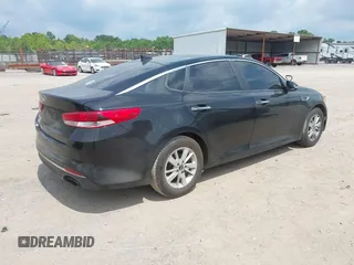 2018 Kia Optima LX with VIN 5XXGT4L35JG239062, listed as a IAAI auction lot 42457308 with 137,280 mi miles and . Bid and sale history available at DreamBid. Image 4.