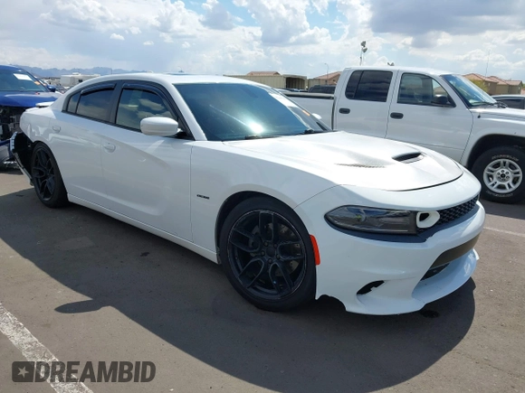 2015 Dodge Charger RT z VIN 2C3CDXCT4FH745861, wystawiony jako IAAI lot #42206349 z przebiegiem 136 061 mil mil oraz . Historia ofert i sprzedaży dostępna na DreamBid. Obrazek 1.