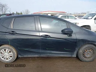 2015 Honda Fit LX with VIN 3HGGK5H50FM768011, listed as a IAAI auction lot 41499374 with 142,211 mi miles and . Bid and sale history available at DreamBid. Image 14.
