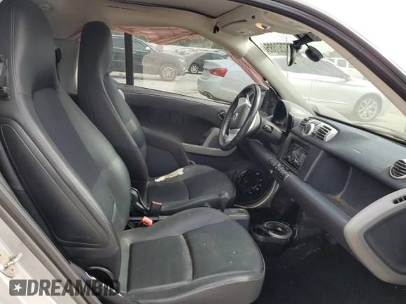2013 Smart fortwo Pure с VIN WMEEJ3BA9DK618746, выставлен на аукционе Copart как лот 56752885 с пробегом 80 293 миль миль и Списание • Salvage title. История ставок и продаж доступна на DreamBid. Изображение 10.