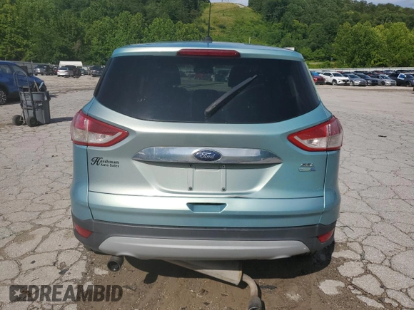 2013 Ford Escape SEL z VIN 1FMCU9H98DUC56048, wystawiony jako Copart lot #61613085 z przebiegiem 198 102 mil mil oraz Szkoda całkowita • Salvage title. Historia ofert i sprzedaży dostępna na DreamBid. Obrazek 6.