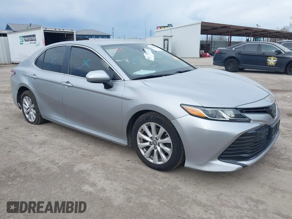 2019 Toyota Camry LE z VIN 4T1B11HK3KU769178, wystawiony jako IAAI lot #41348861 z przebiegiem 121 069 mil mil oraz . Historia ofert i sprzedaży dostępna na DreamBid. Obrazek 1.