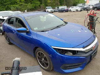 2017 Honda Civic LX z VIN 19XFC2F53HE217867, wystawiony jako IAAI lot #42296194 z przebiegiem 104 670 mil mil oraz . Historia ofert i sprzedaży dostępna na DreamBid. Obrazek 1.