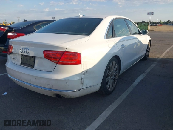 2013 Audi A8 3.0L z VIN WAURGAFD5DN009804, wystawiony jako IAAI lot #42642523 z przebiegiem 141 252 mil mil oraz . Historia ofert i sprzedaży dostępna na DreamBid. Obrazek 4.