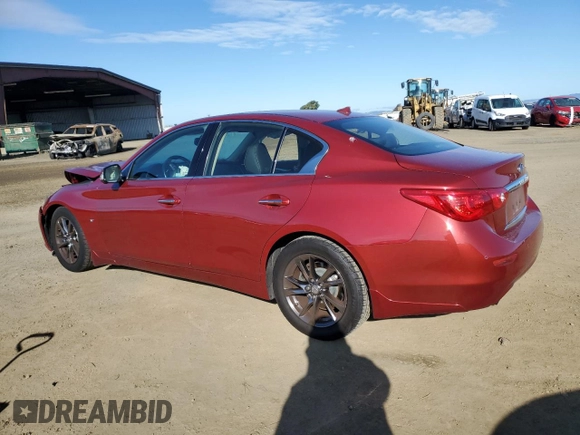2015 Infiniti Q50 Premium with VIN JN1BV7AP7FM355136, listed as a Copart auction lot 56586325 with 101,384 mi miles and Salvage title. Bid and sale history available at DreamBid. Image 2.