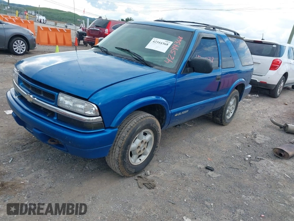2000 Chevrolet Blazer LS z VIN 1GNCT18W6YK288858, wystawiony jako IAAI lot #42344368 z przebiegiem 207 183 mil mil oraz . Historia ofert i sprzedaży dostępna na DreamBid. Obrazek 2.