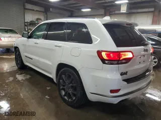 2021 Jeep Grand Cherokee Overland with VIN 1C4RJFCGXMC527435, listed as a Copart auction lot 49642405 with 84,485 mi miles and Salvage Title. Bid and sale history available at carsss.com. Image 2.