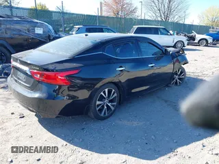 2016 Nissan Maxima SL with VIN 1N4AA6AP3GC408894, listed as a IAAI auction lot 42051320 with 128,516 mi miles and . Bid and sale history available at DreamBid. Image 4.