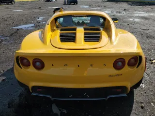 2005 Lotus Elise z VIN SCCPC11185HL34674, wystawiony jako Copart lot #50975385 z przebiegiem 63 194 mil mil oraz Szkody całkowita. Historia ofert i sprzedaży dostępna na DreamBid. Obrazek 6.