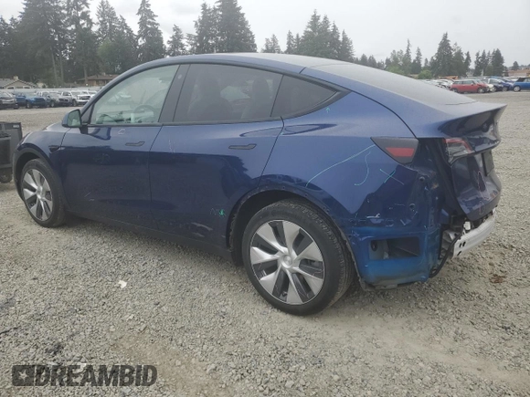2022 Tesla Model Y Long Range z VIN 7SAYGDEE6NF429651, wystawiony jako Copart lot #57172355 z przebiegiem 19 499 mil mil oraz Szkoda całkowita • Salvage title. Historia ofert i sprzedaży dostępna na DreamBid. Obrazek 2.