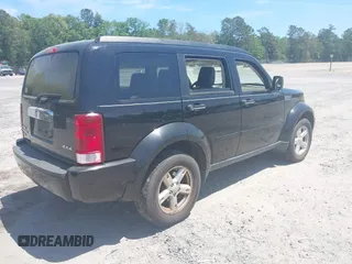 2007 Dodge Nitro SLT with VIN 1D8GU58K37W682094, listed as a IAAI auction lot 42155006 with 115,748 mi miles. Bid and sale history available at carsss.com. Image 4.