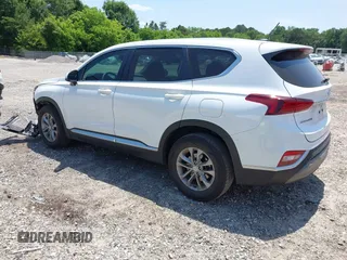 2019 Hyundai Santa Fe SE with VIN 5NMS23AD0KH013811, listed as a IAAI auction lot 42337926 with 87,000 mi miles and . Bid and sale history available at DreamBid. Image 3.