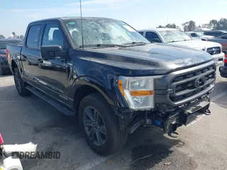 2023 Ford F-150 XL with VIN 1FTFW1ED8PFD08597, listed as a IAAI auction lot 41613094 with 7,266 mi miles and . Bid and sale history available at carsss.com. Image 1.
