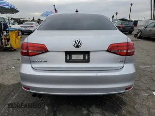 2015 Volkswagen Jetta SE with VIN 3VWD17AJ5FM260475, listed as a Copart auction lot 84764864 with 119,189 mi miles and Salvage title. Bid and sale history available at DreamBid. Image 6.