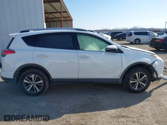 2018 Toyota RAV4 XLE with VIN JTMWFREV7JJ728184, listed as a IAAI auction lot 41377413 with 117,957 mi miles. Bid and sale history available at carsss.com. Image 12.
