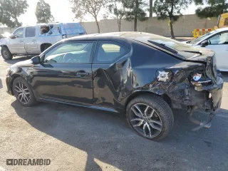 2016 Scion tC with VIN JTKJF5C79GJ020110, listed as a Copart auction lot 86995214 with 79,165 mi miles and Salvage Title. Bid and sale history available at carsss.com. Image 2.