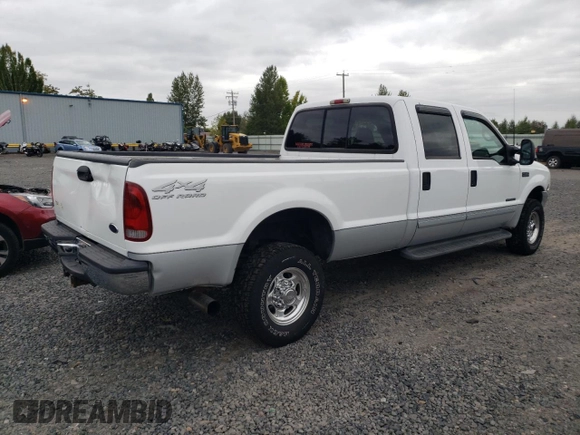 2002 Ford F-350 XL with VIN 3FTSW31F32MA17869, listed as a Copart auction lot 71828914 with 230,191 mi miles and Salvage Title. Bid and sale history available at DreamBid. Image 3.
