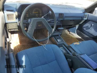 1983 Toyota Celica z VIN JT2RA64L7D6174381, wystawiony jako Copart lot #75986554 z przebiegiem 312 583 mil mil oraz Szkoda całkowita • Salvage title. Historia ofert i sprzedaży dostępna na DreamBid. Obrazek 8.