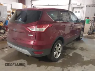 2015 Ford Escape SE with VIN 1FMCU0GXXFUC86876, listed as a IAAI auction lot 41727877 with 114,387 mi miles. Bid and sale history available at carsss.com. Image 4.