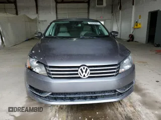2014 Volkswagen Passat S z VIN 1VWAT7A36EC106565, wystawiony jako Copart lot #53965625 z przebiegiem 130 936 mil mil oraz Szkoda całkowita • Salvage title. Historia ofert i sprzedaży dostępna na DreamBid. Obrazek 5.