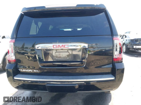 2015 GMC Yukon XL Denali with VIN 1GKS1JKJ1FR134428, listed as a IAAI auction lot 42149588 with 116,207 mi miles. Bid and sale history available at carsss.com. Image 16.