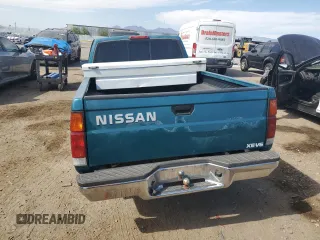 1995 Nissan Frontier XE z VIN 1N6HD16S7SC401954, wystawiony jako Copart lot #52923105 z przebiegiem 98 441 mil mil oraz Szkoda całkowita • Salvage title. Historia ofert i sprzedaży dostępna na DreamBid. Obrazek 6.