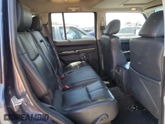 2008 Jeep Commander Limited z VIN 1J8HG58298C243410, wystawiony jako Copart lot #53682205 z przebiegiem 181 388 mil mil oraz Szkoda całkowita • Salvage title. Historia ofert i sprzedaży dostępna na DreamBid. Obrazek 11.