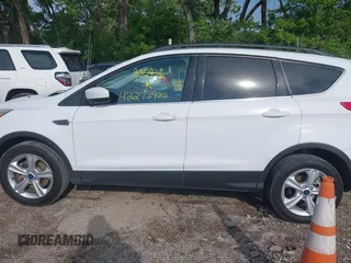 2014 Ford Escape SE with VIN 1FMCU9G92EUB32926, listed as a IAAI auction lot 42273922 with 172,193 mi miles and . Bid and sale history available at DreamBid. Image 14.