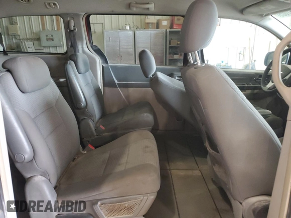 2010 Chrysler Town & Country LX with VIN 2A4RR4DE6AR198174, listed as a Copart auction lot 50757005 with 211,130 mi miles and Salvage Title. Bid and sale history available at DreamBid. Image 11.