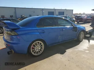 2015 Mitsubishi Lancer Evolution GSR with VIN JA32W8FV6FU006930, listed as a Copart auction lot 84628474 with 116,819 mi miles and Salvage Title. Bid and sale history available at carsss.com. Image 3.