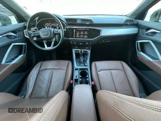 2021 Audi Q3 Premium z VIN WA1AUCF3XM1102363, wystawiony jako Copart lot #58672195 z przebiegiem 208 956 mil mil oraz Tytuł czysty. Historia ofert i sprzedaży dostępna na DreamBid. Obrazek 9.