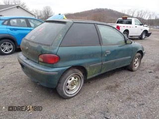 1996 Geo Metro z VIN 2C1MR2290T6780279, wystawiony jako IAAI lot #41792946 z przebiegiem 160 002 mil mil oraz . Historia ofert i sprzedaży dostępna na DreamBid. Obrazek 4.